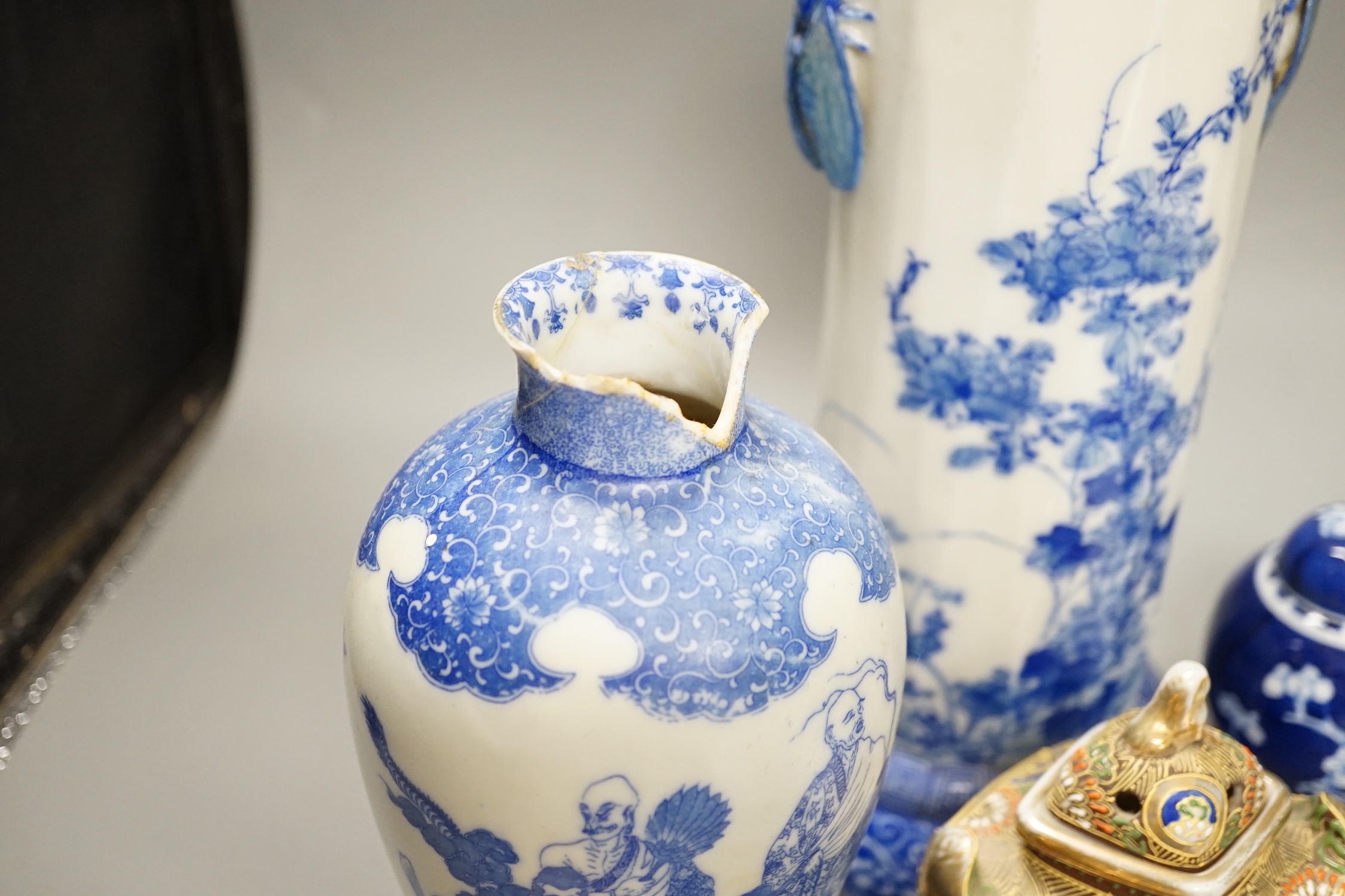 A group of 20th century Chinese and Japanese ceramics, including a blue and white circular plaque, 31 cm diameter